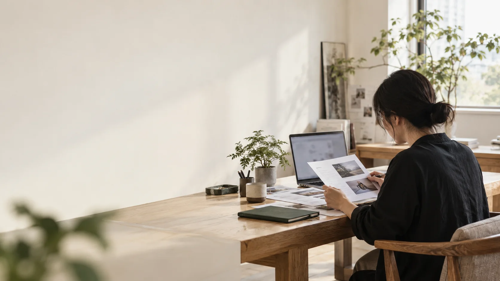 Concept scene of reviewing website content and source material in a studio